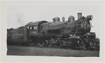 (TRAINS--PENNSYLVANIA RAILROAD) A binder assembled by the artist Lewis Smith with approximately 280 snapshots of steam locomotives.